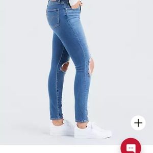 Levi’s 721 high rises ripped skinny jeans